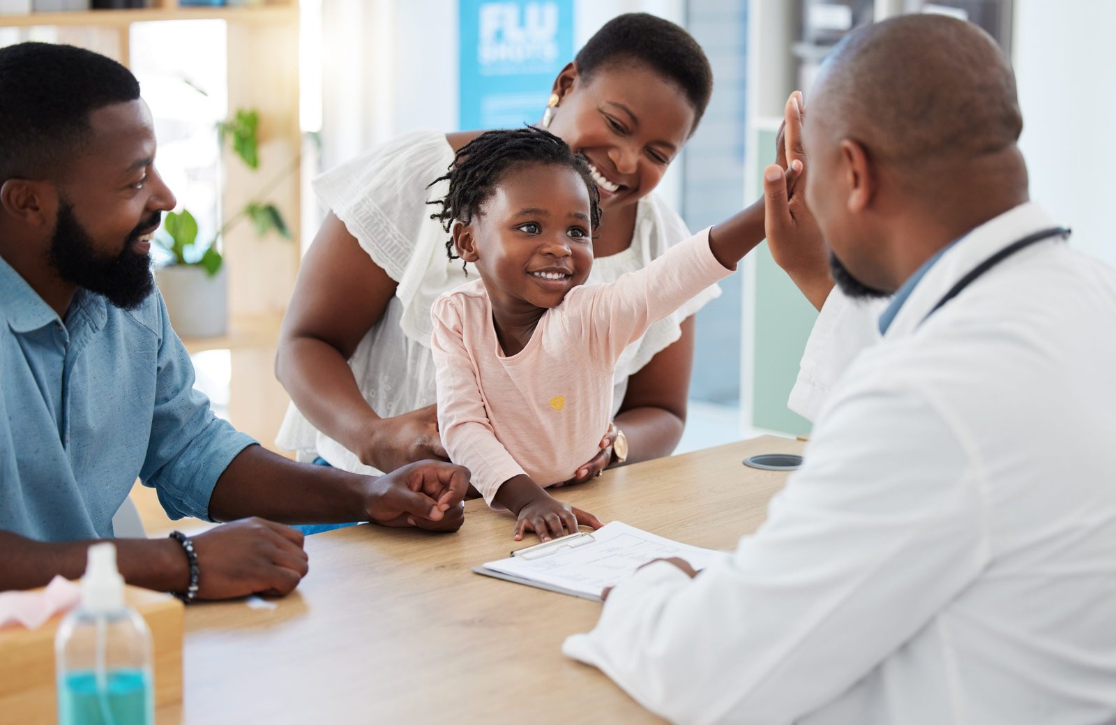 A family with a young child at a primary care visit